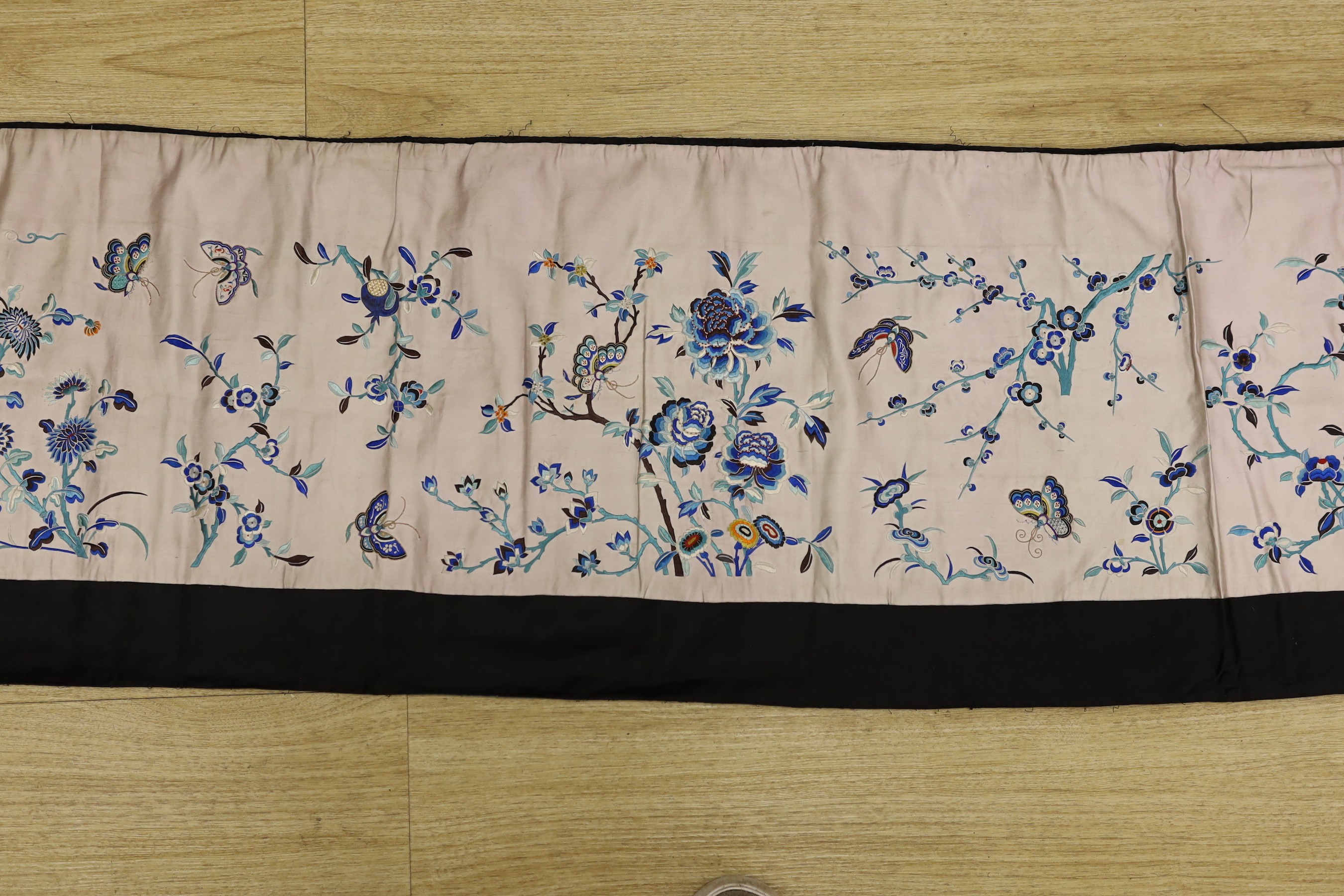 A Chinese polychrome silk embroidered panel, possibly part of a Chinese robe